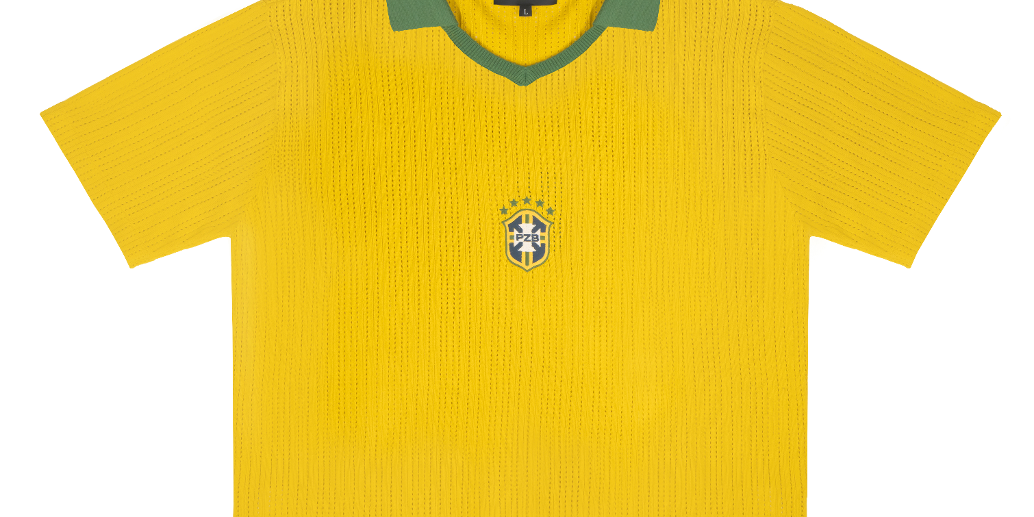 Front view of Brazil-inspired retro knit football shirt in yellow with green polo collar and embroidered crest