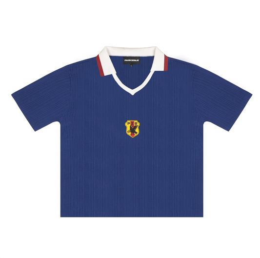Front view of Japan 1998 "Samurai Blue" Retro Knit Football Shirt featuring a central woven crest and contrast white V-neck collar.